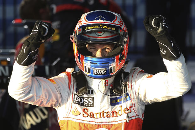 McLaren driver Jenson Button of Britain celebrates  