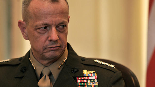 U.S Gen. John Allen, commander of NATO and U.S. forces in Afghanistan, looks on during a document-signing ceremony at the foreign ministry in Kabul, Afghanistan, March 9, 2012. 