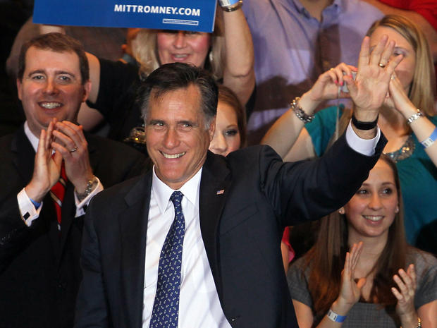 Mitt Romney greets supporters during an Illinois GOP primary victory party 