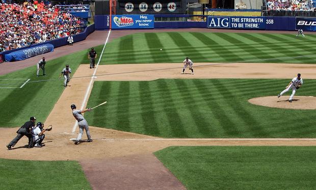 Chipper Jones launches the ball into the seats at Shea Stadium 