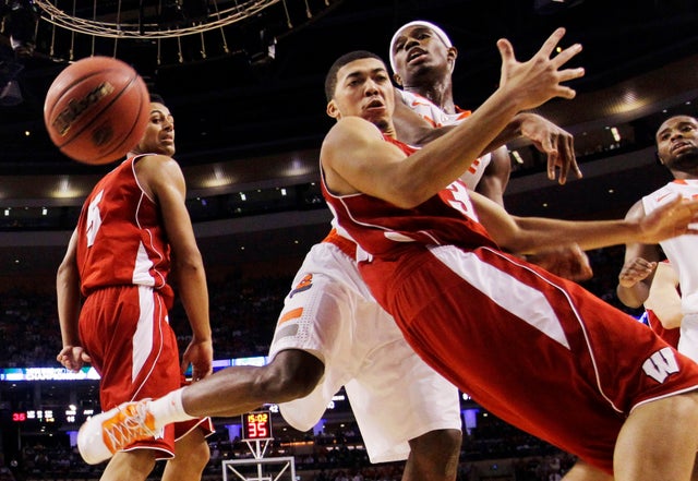 Rob Wilson and  C.J. Fair scrap for a loose ball 