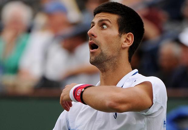 Novak Djokovic reacts during his men's singles semifinal match  