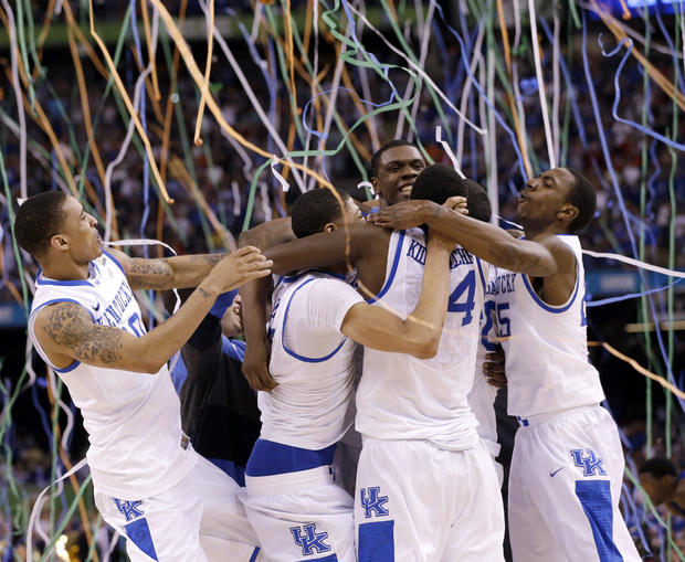 Kentucky players celebrate at the end of the NCAA Final Four  