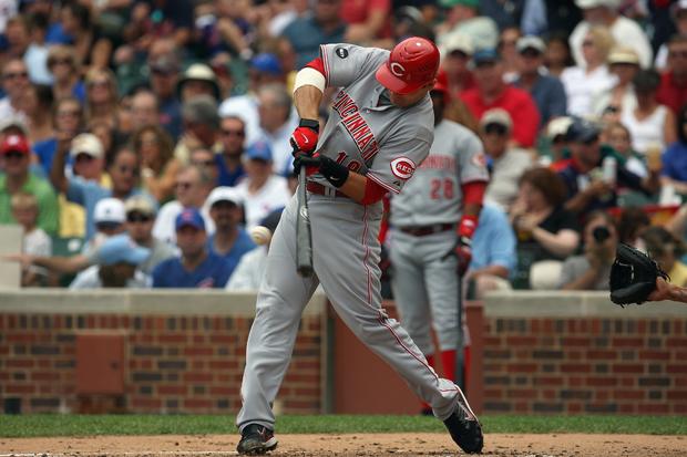 Joey Votto bats against the Chicago Cubs 