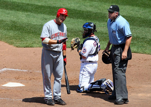 Joey Votto argues with home plate umpire Bill Welke 