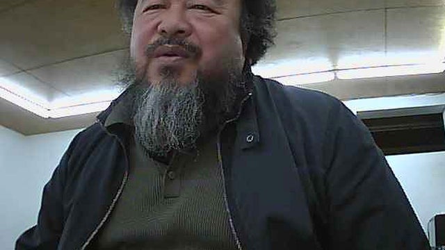 Ai Weiwei appears on a webcam in his home 