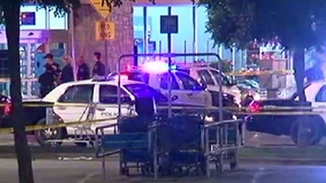 A police officer was fatally shot at an Austin Walmart, April 6, 2012. 