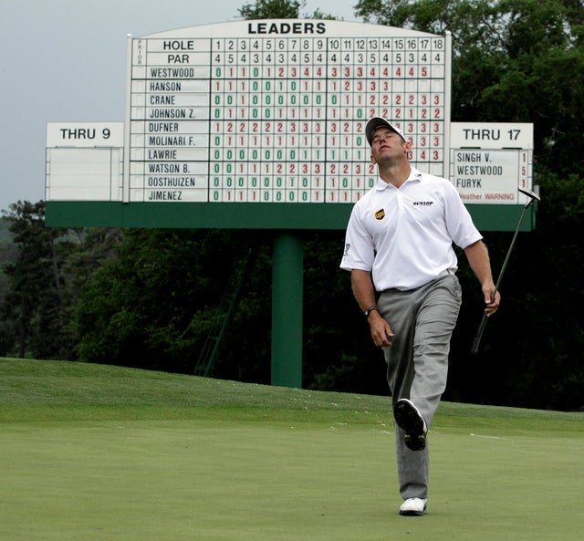 Lee Westwood reacts after missing a birdie putt 