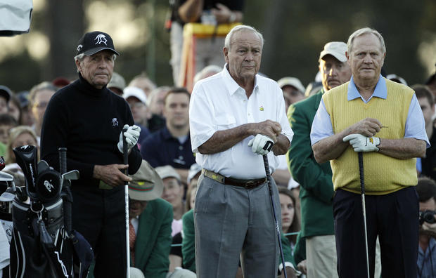 Honorary starters, from left, Gary Player, Arnold Palmer and Jack Nicklaus wait to tee off on the first hole 