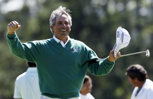 Fred Couples celebrates after finishing the second round  
