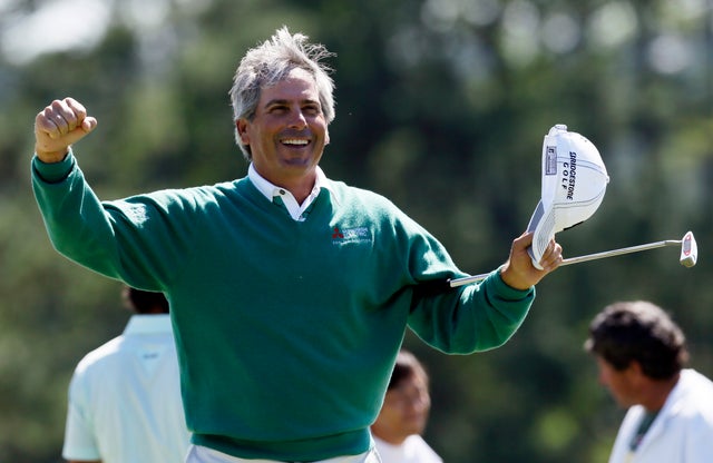 Fred Couples celebrates after finishing the second round  
