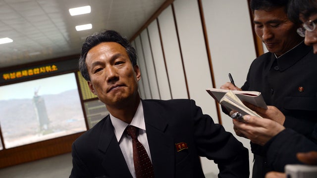 Paek Chang Ho, director of the satellite control center in North Korea, speaks to journalists at the center's satellite control room on the outskirts of Pyongyang, North Korea, April 11, 2012. 