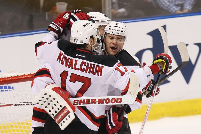 Martin Brodeur, Ilya Kovalchuk, Travis Zajaz and Marek Zidlicky celebrate their 3-2 win o 