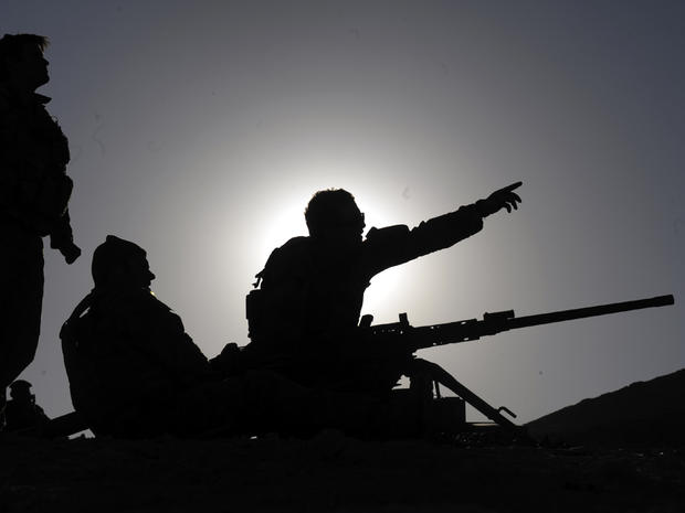 Australian soldiers of the Omlet-c Company fix their target prior to practice firing at their forward operating base in Mirwais, Afghanistan, Jan. 20, 2010. 