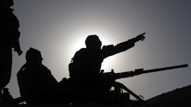 Australian soldiers of the Omlet-c Company fix their target prior to practice firing at their forward operating base in Mirwais, Afghanistan, Jan. 20, 2010. 