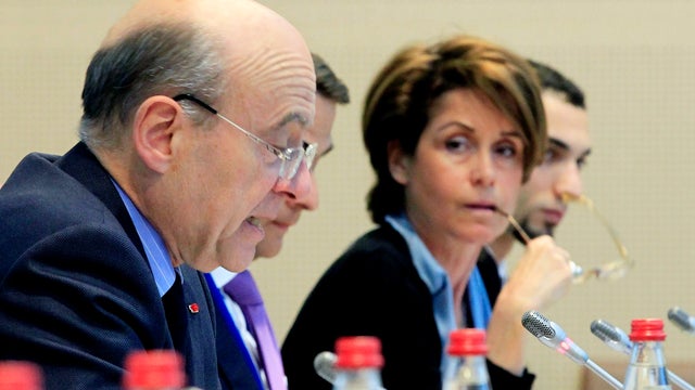 Syrians gather for a funeral for 6-year-old Yousef al-Najjar in Douma, Syria, April 16, 2012. The boy's family says he as was shot in the chest when Syrian forces opened fire on the family car. 