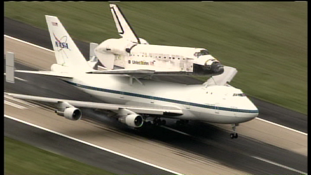 Space Shuttle Discovery Tues. April 17, 2012 as it hitched a ride from the Kennedy Space Center in Brevard, Fla., mounted atop a 747. 