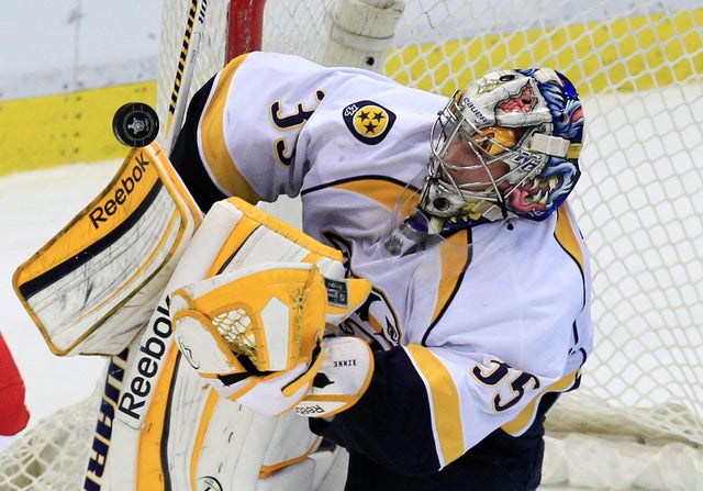 Pekka Rinne deflects a shot 