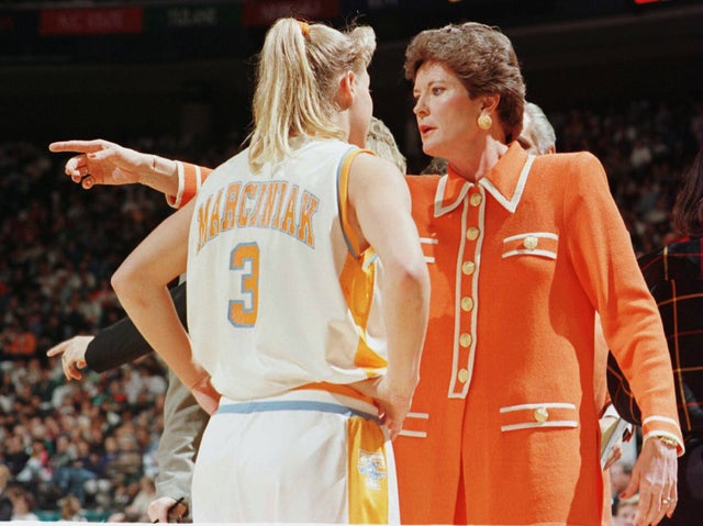 Pat Summitt instructs player Michelle Marciniak 