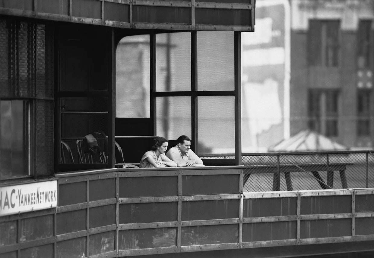 Tom Yawkey sits with his wife in his private box  