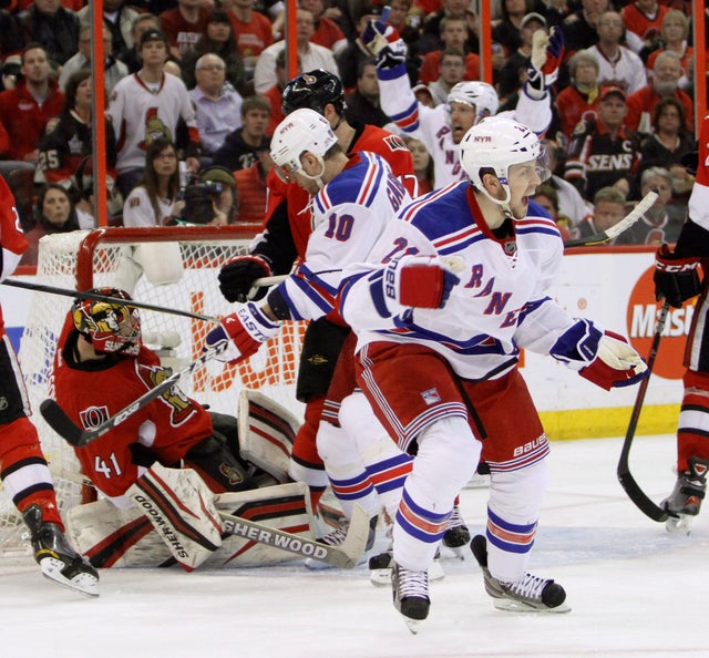 Derek Stepan celebrates a New York goal 