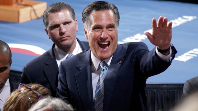 Mitt Romney greets supporters  