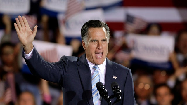  Mitt Romney takes the stage at an election night rally 