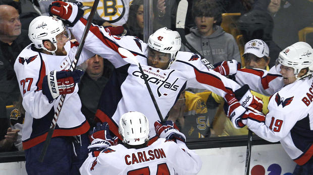 Joel Ward is congratulated by teammates after his game-winning goal  