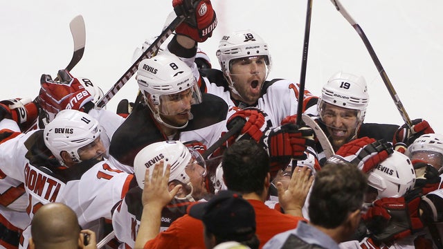 Devils celebrate after defeating the Panthers 