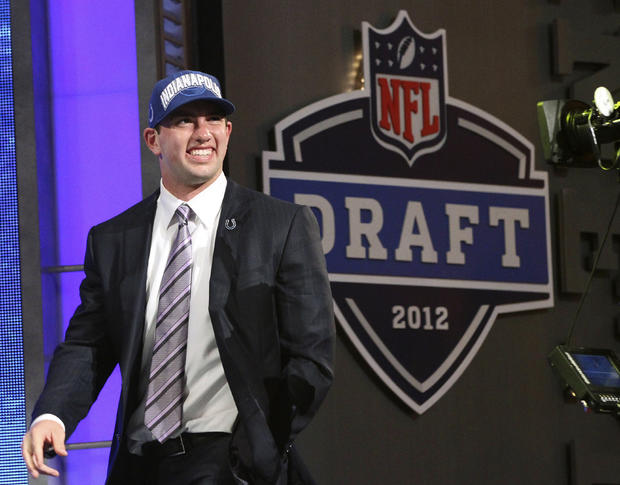 Andrew Luck walks on stage  