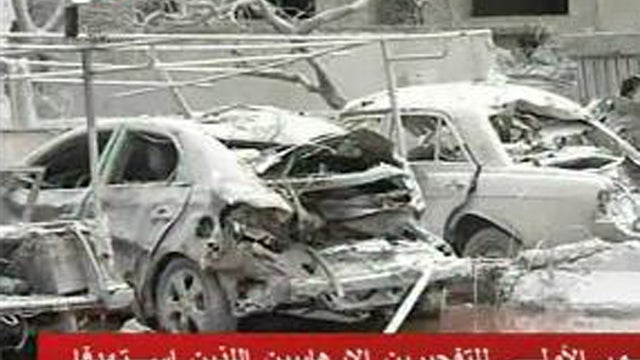Cars destroyed by a bomb blast in Idlib 