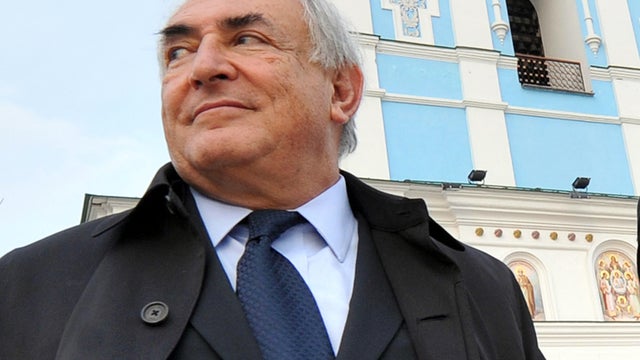 French economist, lawyer and politician Dominique Strauss-Kahn stands in front of the Mykhaylovsky cathedral in Kiev, Ukraine, April 4, 2012. 