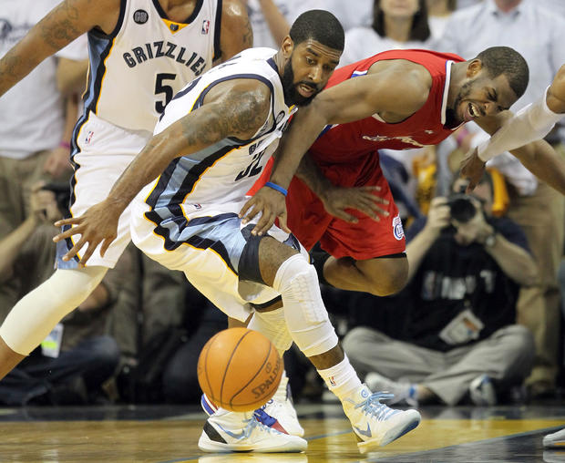 O.J. Mayo and Chris Paul battle for a loose ball 