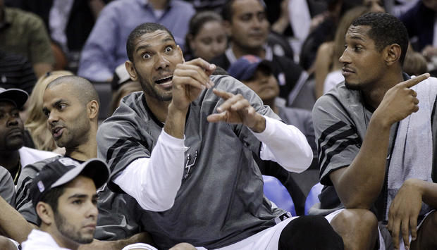 Tim Duncan reacts on the bench 