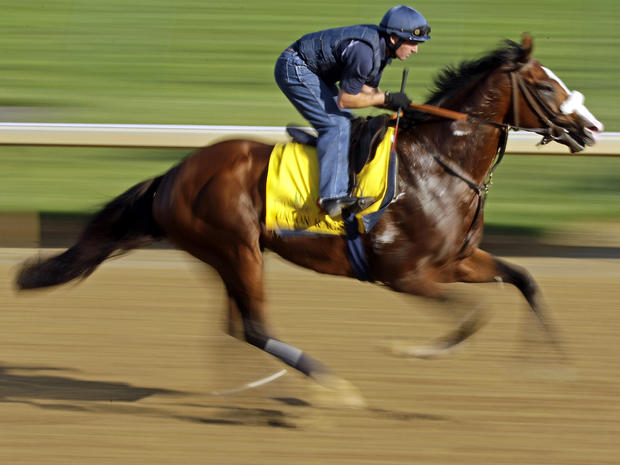 Exercise rider Peter Brette takes Kentucky Derby entrant Union Rags for a workout at Churchill Downs May 2, 2012, in Louisville, Ky. 