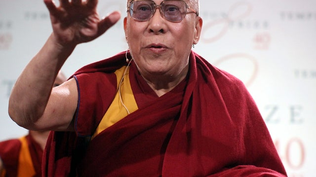 His Holiness the Dalai Lama attends a press conference in St Paul's Cathedral before receiving the 2012 Templeton Prize May 14, 2012, in London. 