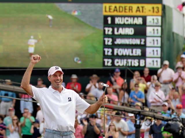 Matt Kuchar reacts on the 18th green 