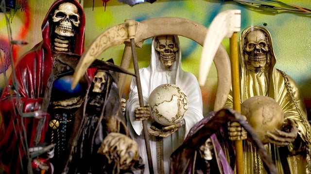 Images of the "Santa Muerte" (Holy Death), are seen at the shrine in honor of the goddess at the Iztapalapa shantytown in Mexico City Feb. 4, 2011. 