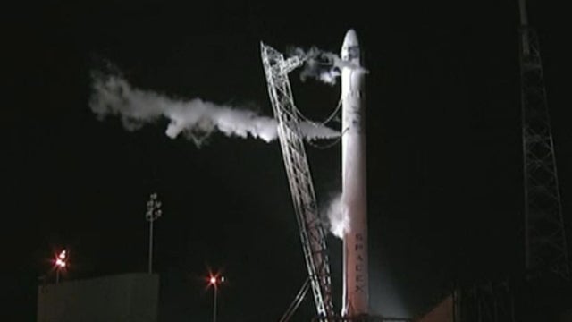 Framegrab from NASA-TV shows Falcon 9 SpaceX rocket being fueled on launch pad at complex 40 at the Cape Canaveral Air Force Station in Cape Canaveral, Fla., early Saturday 