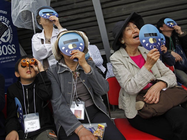 solar eclipse, tokyo, japan 