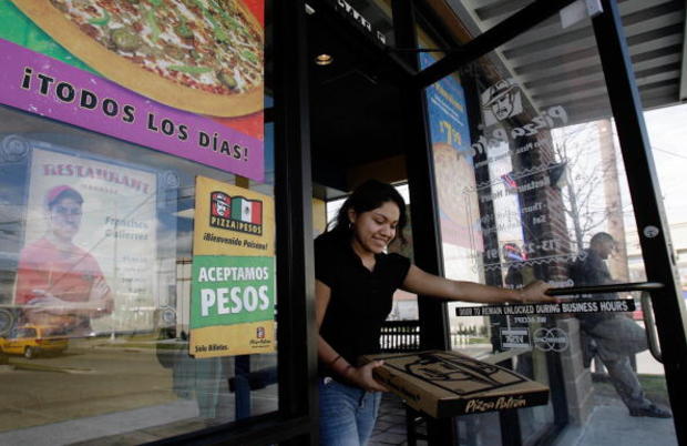 Pizza Restaurant Stirs Controversy By Accepting Mexican Pesos 
