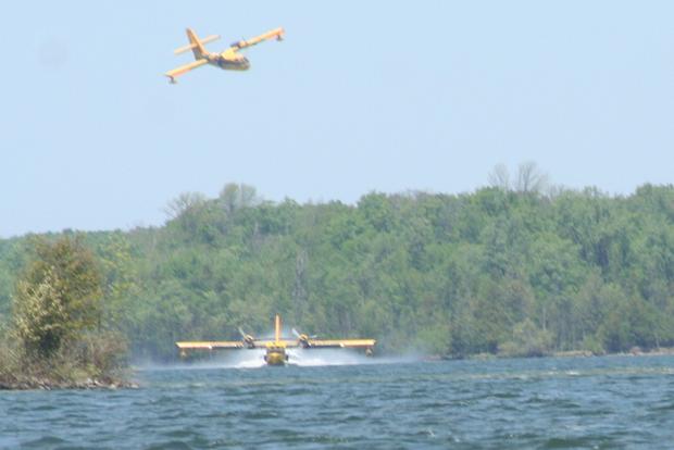 Pine Creek North Wildfire_ 5.24.12_ CL-215 Air Tankers collecting water from Big Manistique Lake 