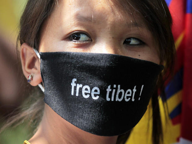 Tibetan exile participates in a protest against Chinese rule over Tibet in New Delhi 
