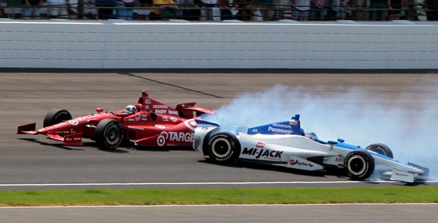 Takuma Sato spins in the first turn 