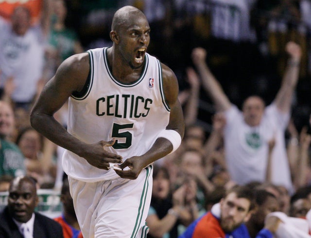 Kevin Garnett screams after he scored 