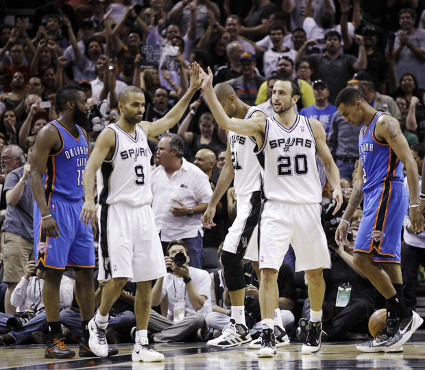 San Antonio Spurs point guard Tony Parker (9) and Manu Ginobili (20) celebrate 