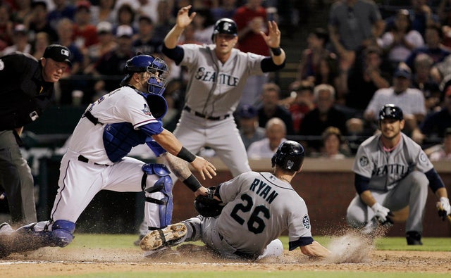 Mike Napoli tags out Brendan Ryan 