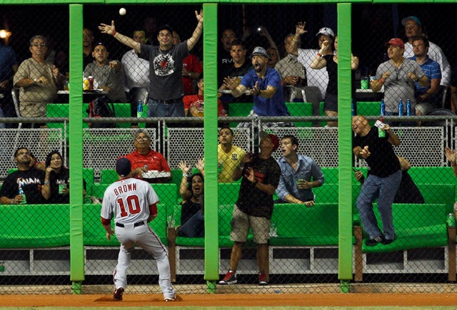 Corey Brown can't get to an RBI double hit  