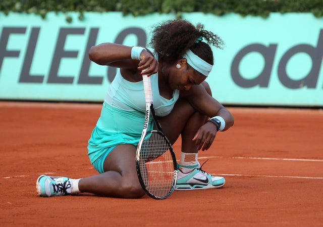 Serena Williams reacts shortly before losing 