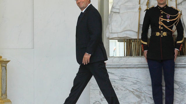 French President Francois Hollande smiles after his weekly cabinet meeting in Elysee Palace, Paris, Wednesday, June 6, 2012. 